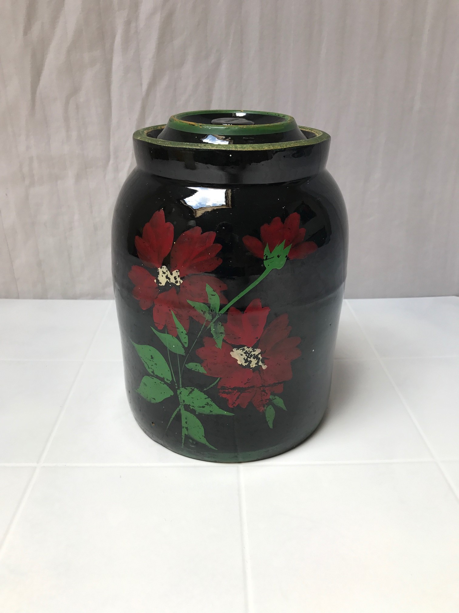 BLACK CANISTER COOKIE JAR WITH FLORAL DESIGN