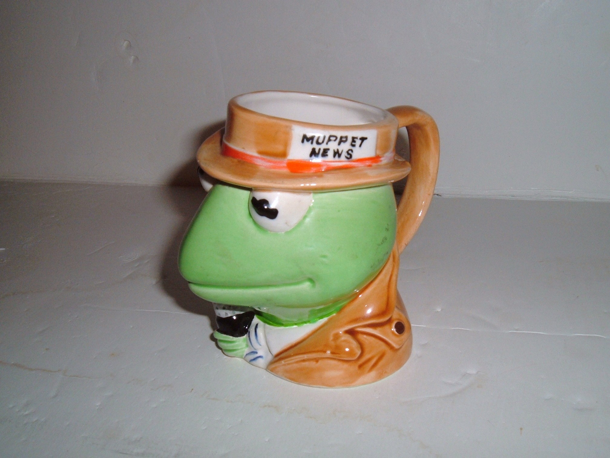 http://www.cookiejarstore.com/media/catalog/product/cache/1/image/9df78eab33525d08d6e5fb8d27136e95/s/i/sigmakermitmug471.jpg